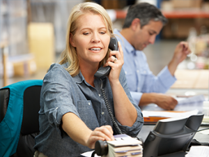 Employee Assistance Program representative on phone making referrals for employees