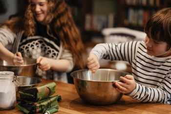 boy and girl baking in kitchen
