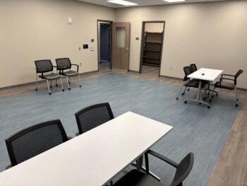 Chairs and tables stand ready for use in a group therapy room at a Centerstone clinic in Marshfield, Missouri. The room provides meeting space for recovery groups and mental health support groups of several types. It can also be a place where therapists and peer support specialists meet with clients.