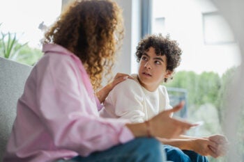 Mother and son arguing with each other at home Mother and son arguing with each other at home