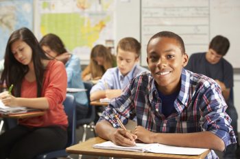 Kids in classroom at school.