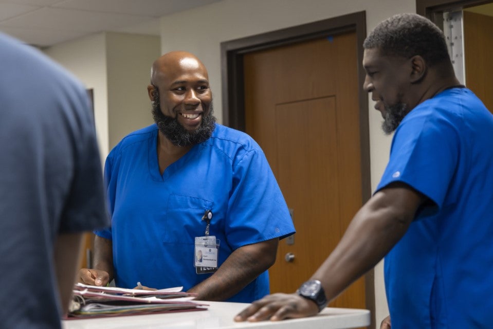 Florida Hospital Behavioral Health Techs Smiling Two behavioral health professionals at Centerstone