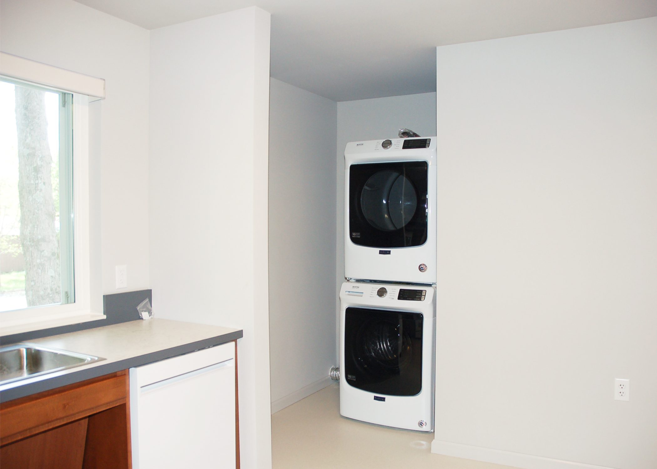 interior of Milestone Apartments with in-unit washing machine